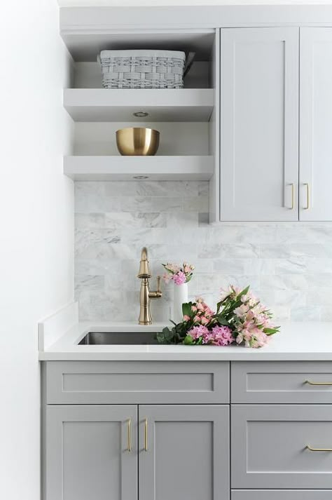 Laundry Room Tile Ideas: 33 Design Ideas to Inspire Your Remodel 7 Kitchen With Gray Cabinets, White Marble Backsplash, Gray Shaker Cabinets, Grey Kitchen Designs, Laundry Room Sink, Laundry Design, Gray Cabinets, Transitional Home, Laundry Room Inspiration