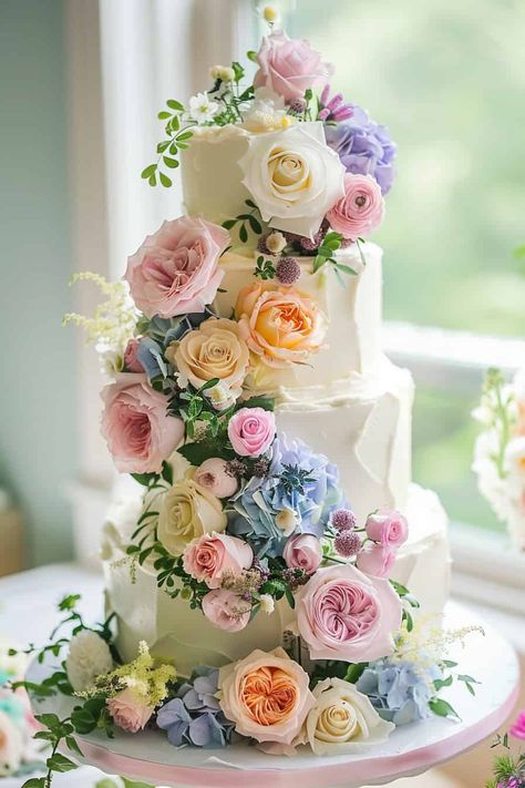 Floral Wedding Cake Ideas Wedding Cake Flower Meadow, Pastel Flower Wedding Cake, Wedding Cake Spring Flowers, Wedding Cakes Summer, Spring Wedding Cakes, Pastel Wedding Cakes, Hydrangea Cake, Peony Cake, Geometric Cake