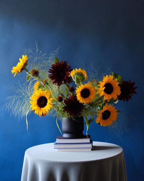 Introducing our NEWEST product: “Sunflowers” 🌻🌻 Inspired by our poem of the same name (posted on our profile about a week ago), this arrangement features vibrant yellow and chocolate sunflowers, alongside delicate greens, to capture the essence of late summer beauty. It also comes in a sleek black vase, adding a bit of lively sophistication to any space. Let us know what you think! 💛 Available for purchase on our website: bloomsandpoems.com noelan+mabel blooms and poems. #Flowers #Flo... Sunflower Arrangement, Sunflower Vase, Sunflower Arrangements, Black Vase, Visual Poetry, Summer Beauty, Late Summer, Flower Arrangement, What You Think