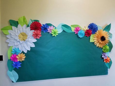 Made this bulletin board  for our amazing Spanish teacher Paper Flowers Bulletin Board, Flowers For Bulletin Board, Spring Door Decorations Classroom, Flowers Bulletin Board, Spring Door Decorations, Flower Bulletin Boards, Art Bulletin Boards, Spring Door Decoration, Teacher Bulletin Boards