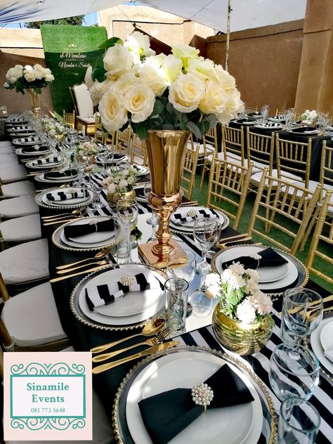 Black and white with a touch of gold Umembeso Decor Table Settings, Membeso Decor, Lobola Decor Ideas, Umembeso Decor, African Traditional Wedding Decoration, Lobola Decor, Emerald Wedding Decor, Zulu Traditional Wedding, Gold Table Decorations