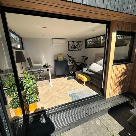 Classic OKOPOD with 300mm porch detail and hybrid burnt/grandis cladding. This OKOPOD garden has created a multi functional space to work, gym and relax. Contact us for mor information info@okopod.com #gardenroom #gardenoffice #gardenpod #homeoffice #office #workfromhome #wfh #annexe #gardengym #homegym #gardenretreat #yogastudio #tinyhome #newbuild #prefabhouse #okopod Cladded Garden Room, Conservatory Extension, Garden Room Ideas, Garden Pods, Functional Space, Garden Office, Prefab Homes, Yoga Studio, Garden Room