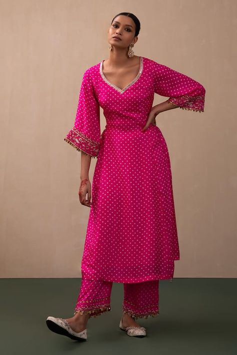 Hot pink silk kurta with bandhani print and mirror hand embroidered neckline and cuffs. Comes with ijar pant. - Aza Fashions Bandhani Indian Outfit, Hot Pink Suits Women Indian, Bandhni Kurti Designs, A Line Kurta Designs, Bandhni Suits Design, Bandhani Kurti Designs, Bandhani Outfit Ideas, Bandhni Kurti Designs Latest, Bandhani Dress Pattern