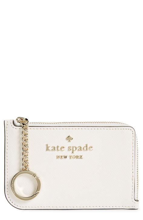 With just enough space for card and coin, this slender zip case is an everyday essential for traveling light. 3.25" x 5" x 0.25" Zip around closure Leather Imported Kate Spade Keychain Wallet, Christmas Gifts For Boyfriend Country, Designer Keychain Wallet, Katespade Card Holder, Cute Wallet Keychain, Wallet With Keychain, Cute Car Stuff, Keychain With Wallet, Car Keychain Aesthetic