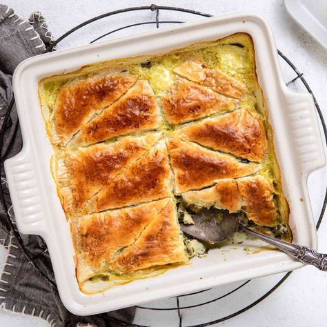 Inspired by the flavors of spanakopita, we put a spin on the dish and turn it into a hearty chicken casserole. If the phyllo dough sheets are larger than the baking dish, cut or fold them in half to fit. Spinach Feta Chicken, Stuffed Pepper Casserole, Feta Chicken, Spinach Pie, Spinach Feta, Phyllo Dough, Creamy Spinach, Spinach Stuffed Mushrooms, Spinach And Feta