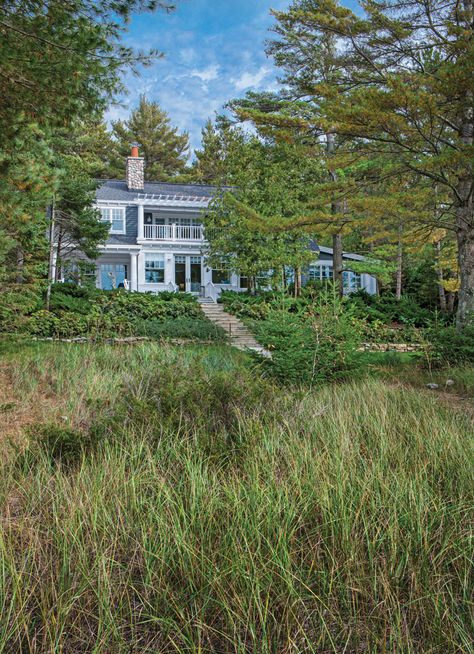 Michigan Lake House, Easter Inspiration Decor, Michigan Cottage, Login Design, Michigan Lake, Three Season Porch, Built In Hutch, Fluted Columns, Dining Room Wallpaper