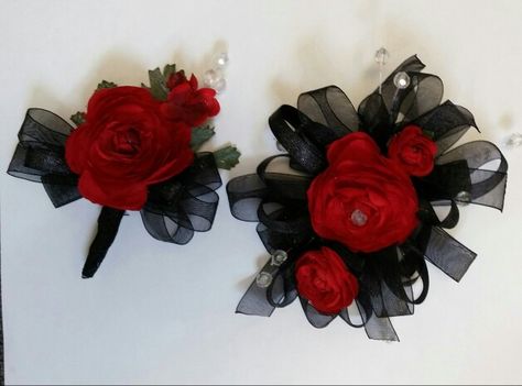 Red & Black wrist corsage and boutonniere By Bride & Bloom Gladwin, Michigan Grad Accessories, Gladwin Michigan, Formal Flowers, Black Corsage, Prom Corsages, Prom Corsage And Boutonniere, Wrist Corsage Prom, Boutonnieres Prom, Wrist Corsages