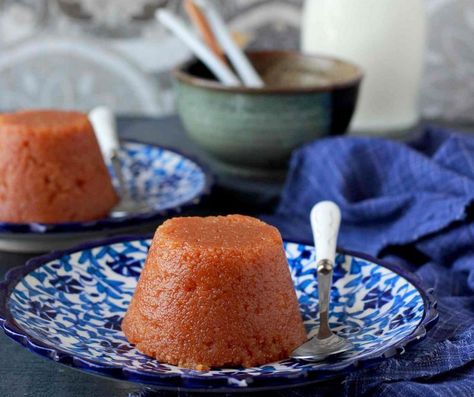 This heirloom recipe, from my mother's side of the family, is a unique and decadent Suji Halwa. What makes it different from the regular halwa is it's unique and unusual method of preparing and cooking. Semolina and all purpose flour is soaked in milk and roasted along with caramelised sugar. I absolutely love this dessert for its inimitable flavours. Serve Mukhadi Halwa as a dessert after your weekday meal of Dal Makhani, Aloo Ki Sabzi and Phulka. If you like this recipe, you can als... Suji Halwa, Semolina Pudding, Halwa Recipe, North Indian Recipes, Caramel Pudding, Eggless Desserts, Heirloom Recipes, Indian Products, Caramelized Sugar