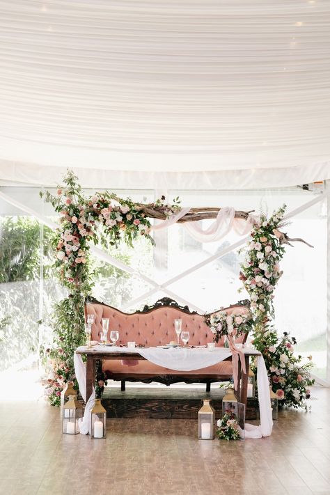 We are crazy in love with this chic riverside wedding in a historic estate. Festooned with cream and burgundy wedding colors, everything from the decorative lanterns spilling out with blooms to the plush velvet sofas will have you begging for a seat at this table. We cannot begin to get over this floral arch backdrop anytime soon, and there is more goodness where this came from on #ruffledblog! Wedding Table Pink, Burgundy Wedding Colors, Riverside Weddings, Sitting Table, Martha Weddings, Wedding Table Designs, Sweetheart Table Wedding, Garden Wedding Venue, Floral Event Design