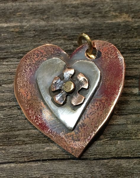 Artisan style, handmade Heart Pendant. Silver heart over copper heart, copper flower, brass rivet for the center, brass jump ring.  Note: All copper components of this pendant are reclaimed from the ashes of the recent Tubbs Fire  10-09-17 Sonoma County, CA. Rivet Jewelry, Etched Jewelry, Silversmithing Jewelry, Loom Jewelry, Copper Jewellery, Sweet Jewelry, Copper Heart, Metalsmithing Jewelry, School Jewelry