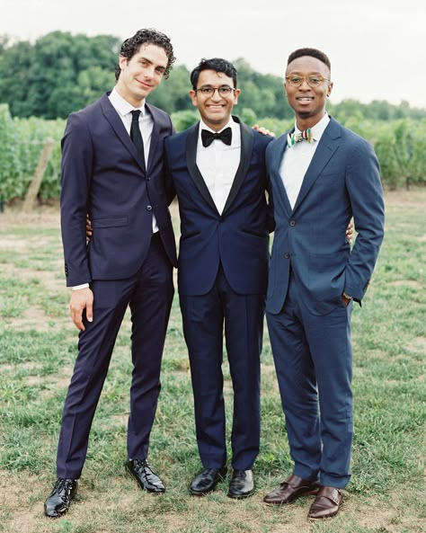 A black-tie wedding means polished suits and ties for the guys, regardless of the season. To give your look a summer vibe, accessorize with a colorful bow tie, à la the guest on the right. Also an option? Instead of the classic navy ensemble, choose something in gray linen. Black Tie Optional Attire, Formal Garden Wedding, Men Wedding Attire Guest, Garden Attire, Garden Party Formal, Formal Wedding Guest Attire, Wedding Guest Dress Code, Black Tie Optional Wedding, Wedding Guest Etiquette