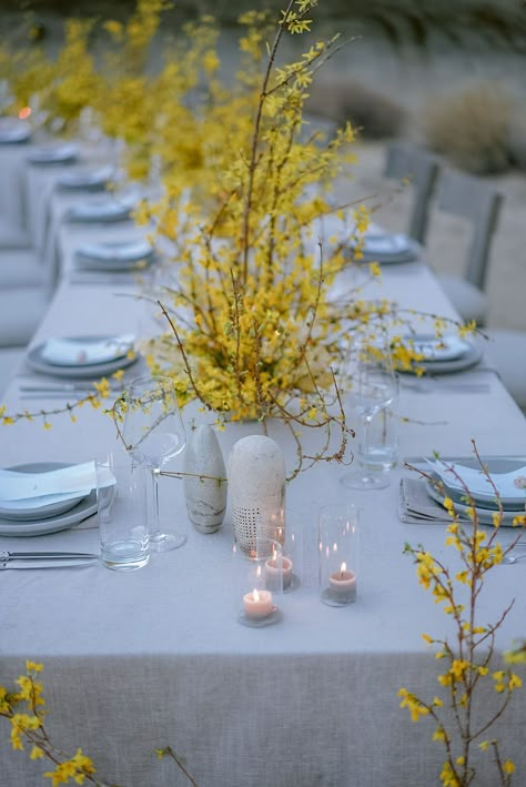 Feature: Sarah Winward | Camp Sarika Experience Forsythia Wedding Centerpiece, Forsythia Wedding Decor, Bogenvilla Wedding Decor, Yellow Centrepiece, Forsythia Wedding, Camp Sarika, Amangiri Wedding, Flower Tablescape, Yellow Tablescape