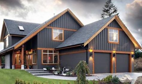 21 Stunning Dark Exterior House Colors for 2024 Dark Exterior House Colors, Blue Exterior House Colors, Dark Exterior House, Brown House Exterior, Dark Grey Houses, Dark Blue Houses, Grey Exterior House Colors, Exterior Gray Paint, Gray House Exterior