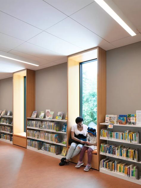 Andrew Berman Architect, Michael Moran · Van Cortlandt Branch Library · Divisare School Library Bookshelves, Arch Library, Cave Library, Boston Library, Architecture Names, Architect Project, Library Seating, Sunrise Home, Steel Architecture