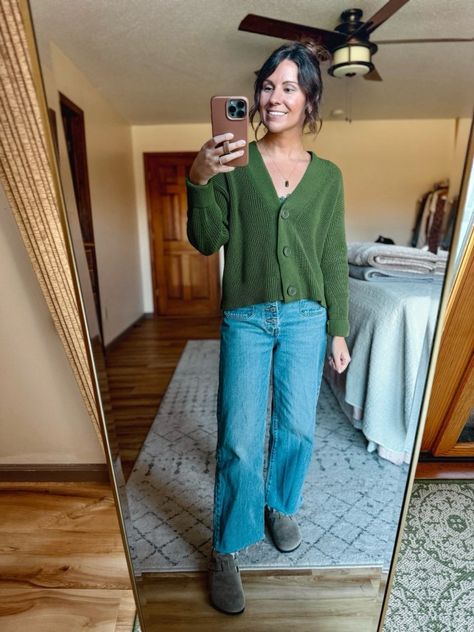 #FeelingFestive24 Green button-front cardigan outfit, denim wide-leg jeans styling, Birkenstock clogs outfit ideas, cozy socks fall outfit, gold jewelry casual look, wide-leg jeans and cardigan, relaxed fall outfit ideas, comfortable and stylish fall outfit, green cardigan with denim, Birkenstock clogs and socks look, autumn outfit with cardigan, chic and cozy fall fashion, casual fall wardrobe ideas, layering with wide-leg jeans, fall style with clogs, effortless fall outfit inspiration, cozy sweater and jeans outfit Cardigan And Dress Pants Outfit, Socks To Wear With Birkenstock Clogs, Winter Clogs Outfit, Jeans Outfit Comfy, Longline Cardigan Outfit, Clogs Outfit Ideas, Clogs And Socks, Birk Clogs, Fall Wardrobe Ideas