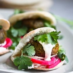 Possibly, the best falafel recipe ever....with home made pita, creamy tahini sauce and pickled turnips. Or try a gluten free falafel salad! Mini Falafel, Home Made Pita, Authentic Falafel Recipe, Best Falafel Recipe, Arabisk Mad, Feasting At Home, Homemade Pita Bread, Falafel Recipe, Falafels