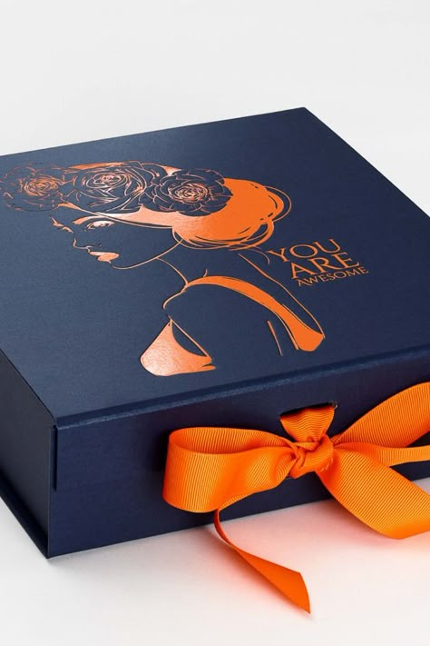 Navy Blue Luxury Gift Box from Foldabox Folding gift boxes available from stock.  Custom printed orange foil design and orange ribbon. Folding Gift Boxes, Luxury Box Design, Luxury Box Packaging, Luxury Packaging Design, Blue Luxury, Foil Design, Luxury Gifts For Her, Gift Box Design, Custom Printed Boxes