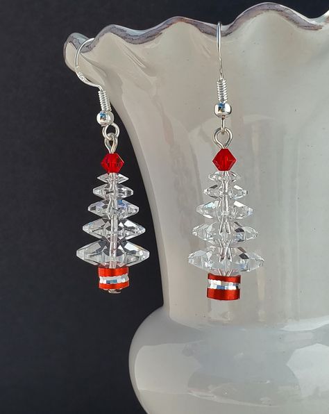 Crystal Christmas Tree Earrings, Swarovski Christmas Tree, 5 Tier Earring, Shades of Red Christmas, Sterling Silver, Holiday Earrings, Handmade Total measurement from top of Ear Wire is approximately 1 1/2".  The total length of the Tree is 1" from the point of dangle.  The French Ear Wire is made of 925 Sterling Sterling Silver. A Special Gift for Someone Special or just a little something to put you in the Christmas Spirit, these Little Trees are sure to catch a "Twinkle" in their eye. Thank y Christmas Earings, Christmas Jewerly, Swarovski Christmas Tree, Xmas Earrings, Christmas Beading, Christmas Jewelry Diy, Swarovski Christmas, Custom Charm Bracelet, Angel Bracelet