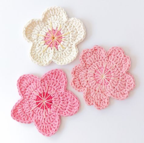 [FREE PATTERN] Crochet These Easy And Pretty Spring Blossom Coasters – The Morning Hooker Sakura Coaster Crochet, Crochet Floral Coasters Free Pattern, Pink Crochet Coasters, Crochet Rose Coaster, Spring Crochet Coasters, Free Crochet Ideas, Flower Coaster Crochet Pattern Free, Crochet Flower Coasters Free Pattern, Flower Coasters Crochet