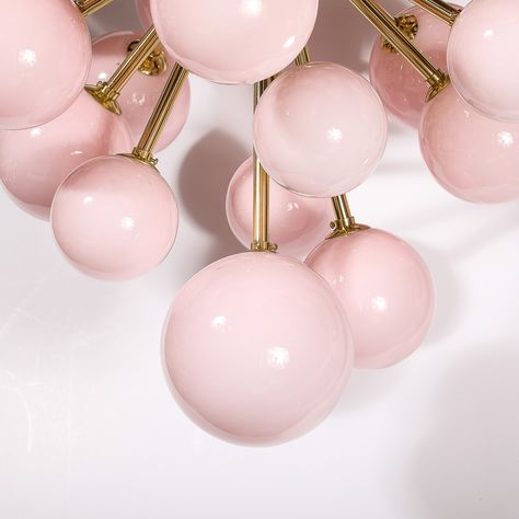 Modernist Handblown Murano Frosted Pink Hue Glass & Brass Sputnik Chandelier This elegant and well balanced Modernist Handblown Murano Glass Sputnik Chandelier w/ Frosted Pink Hued Shades & Brass Fittings originates from Italy during the 21st Century. Features a sputnik form with a spherical brass center from which numerous arms extend, housing rounded hand-blown glass shades in a beautiful frosted pink hue. Diffusing the light and providing a lovely combination of geometric and organic sens... Pink Chandelier, Sputnik Chandelier, Brass Fittings, Hand Blown Glass, Murano Glass, Blown Glass, 21st Century, Hand Blown, Glass Shades