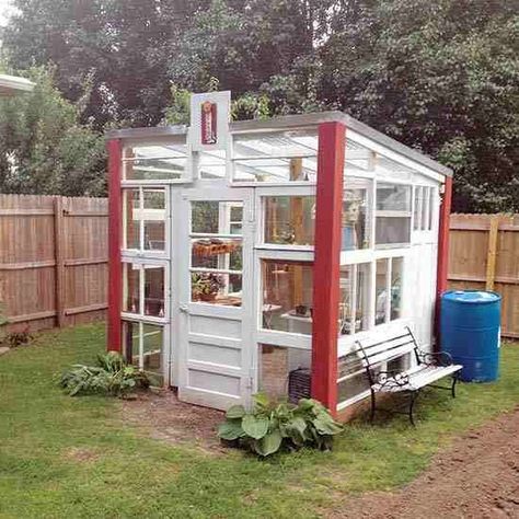 Repurpose old glass windows and doors by assembling them into a beautiful and unique greenhouse. Recycled Windows, Window Greenhouse, Greenhouse Design, Recycled Door, Herbs Garden, Build A Greenhouse, Indoor Greenhouse, Home Greenhouse, Backyard Greenhouse