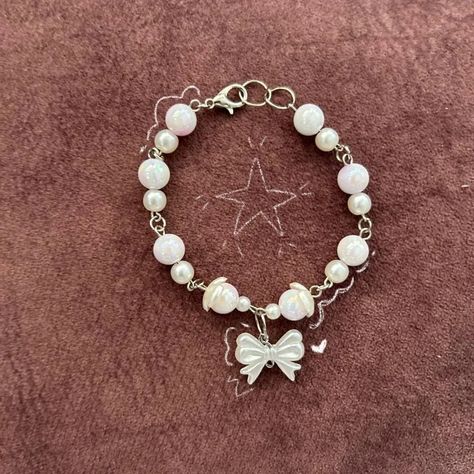 new beads drop - bow charm bracelet ♡ dm if interested ☆ + bracelets available Charms Bracelets, Bow Bracelet, Handmade Jewelry, Charms, Charm Bracelet, Bracelet, Beads, White, Quick Saves