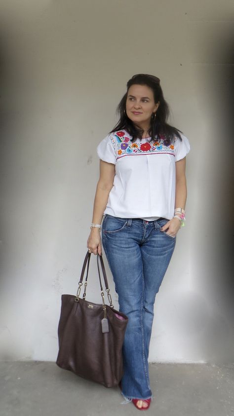 Flower embroidered white Mexican shirt - Jeans Miss Sixty - Brown tote bag Madison Coach      If there is one thing I loathe is hemming. H... Mexican Shirt Outfit, Jeans Mexican, Ta Outfits, What To Pack For Mexico, Pack For Mexico, Red Jeans Outfit, Jalisco Dress, Mexican Boutique, Mexico City Vacation