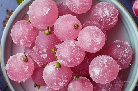 Sweeten your day with Pink Cotton Candied Grapes! 🍇🍭 A magical treat that's both easy and delightful. #SweetSnack #MagicalMunchies Pink Cotton Candied Grapes Recipe 🎀🍇 Ingredients: Grapes (1 lb, washed and dried): The star of the show. 🍇 Pink Cotton Candy Sugar (1/2 cup): For that enchanting flavor. 🍬 Water (to dampen grapes): Helps the sugar stick. 💦 Instructions: Prep Grapes: Ensure grapes are thoroughly washed and dried. 🚿 Dampen: Lightly wet the grapes with water. 💧 Coat: Roll grapes i... Cotton Candy Grapes Recipes, Sugar Grapes, Candied Grapes Recipe, Candied Grapes, Flavor Water, Candy Grapes, Cotton Candy Grapes, Candied Fruits, Sugared Grapes