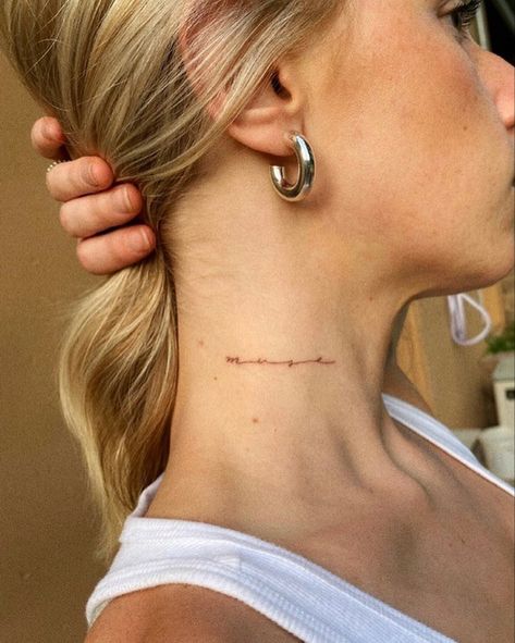 Discrete Neck Tattoo, Muse Neck Tattoo, Tasteful Neck Tattoos, Script On Neck Tattoo, Minimal Neck Tattoos Women, Side Neck Word Tattoo, Simple Word Neck Tattoo, Neck Tattoos Women Dainty, Small Script Neck Tattoo