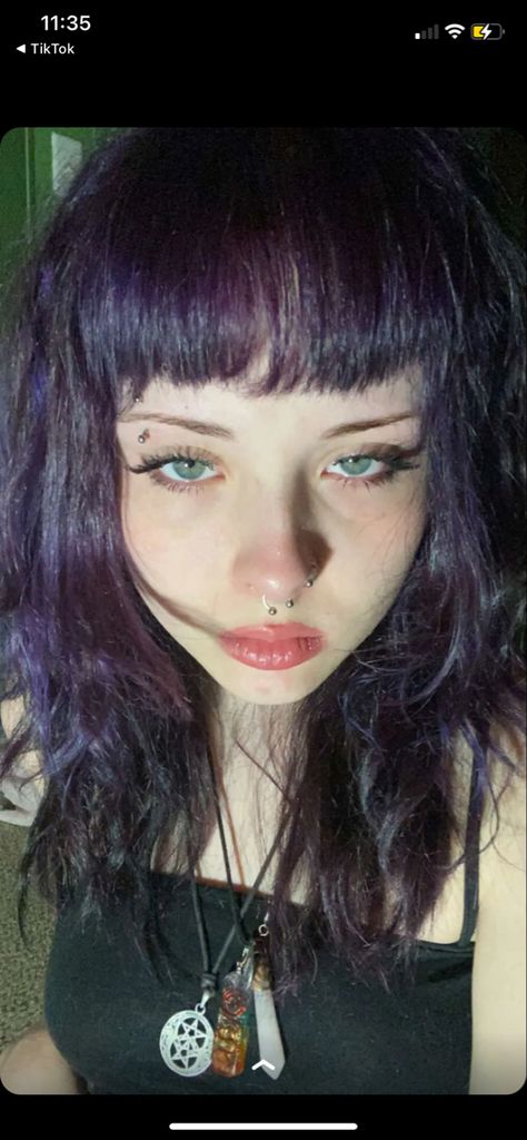 Dark Purple Hair Green Eyes, Dark Purple Hair Grunge, Purple Hair With Bangs Aesthetic, Dark Purple Hair Blue Eyes, Purple Egirl Hair, Purple Black Hair Short, Black And Purple Shag Hair, Black And Purple Color Block Hair, Black Purple Hair Short