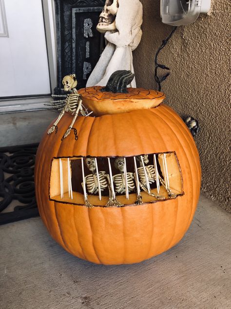 Pumpkin carving with skeleton in jail. Pumpkin With Skeletons Inside, Skeleton Jail Pumpkin, Pumpkin Carving Ideas With Skeletons, Easy Pumpkin Carving Contest Ideas, Pumpkin Carving Ideas Contest, Jail Pumpkin Carving Ideas, Skeleton Pumpkin Carving Ideas, Pumpkin Carving Ideas Skeleton, Pumpkin Carving 2023