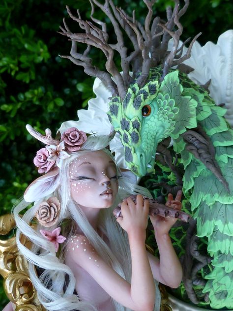 Fawn playing her panpipes for the Forest Dragon. Handmade one of a kind Polymer clay Sculptures by Mystic Reflections. Pixie Clay Sculpture, Fairy Clay Sculpture, Fairy Sculpture Clay, Fantasy Clay, Fairy Pots, Fairy Sculpture, Forest Dragon, Mermaid Sculpture, Ooak Fairy