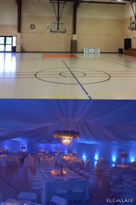 Gymnasium transformation! Blue uplighting with white decor. Gymnasium Prom Decor, Gym Prom Decorations, Gymnasium Wedding Decor, Decorate Gym For Party, Gym Wedding Decorations, Venue Ceiling Decoration, Gym Decorated For Wedding Reception, Gymnasium Wedding Reception, Wedding In A Gymnasium