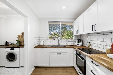 White Kitchen Wooden Benchtop, White Cupboards Black Handles, White Kitchen Timber Benchtop, Kitchen Wooden Benchtop, Bedsitter Ideas, Wooden Benchtop Kitchen, White Kitchen Bench, Timber Benchtop Kitchen, White And Timber Kitchen