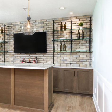 Bar goals achieved! 🍸✨⁠ ⁠ We love how our Bistro Counter to Wall Shelf looks in this beautiful basement bar design. The matte black finish perfectly complements the warm wood tones and ambient lighting.⁠ ⁠ Here's the best part: our shelves are fully customizable! Whether you're working with a cozy nook or a spacious entertainment area, we can fit into any space. We'll tailor the solution from size to finish to your unique needs.⁠ ⁠ Explore more shelving options on our website and let's bring ... Goals Achieved, Basement Bar Design, Warm Wood Tones, Stone Accent Walls, Basement House, Entertainment Area, Dry Bar, Wood Tones, Basement Bar