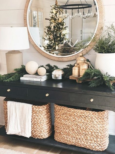 In this blog we are sharing holiday decor and cheer. Get a behind-the-scenes look at Emily, interior designer and owner of Porche & Co.'s holiday home decor. From Christmas trees to stockings, we've got everything you need to make your home merry and bright. Plus, get tips and tricks from our team of holiday decor experts. So whether you're decking the halls or trimming the tree, we've got you covered. Table Decor Entryway, Console Table Decor, Console Table Decorating, Foyer Decor, Warm Christmas, White Candles, Holiday Home Decor, Decoration Design, Entryway Decor