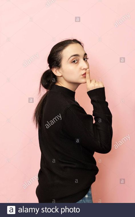 Download this stock image: Keep quiet sign. Portrait of a beautiful woman in casual clothing showing hand gesture keep silence. Tss, Shh. Facial expressions of young female - 2AJTMWD from Alamy's library of millions of high resolution stock photos, illustrations and vectors. Shh Hand Reference, Shh Pose, Keep Quiet, Hand Gesture, Hand Reference, Reference Photos, Facial Expressions, Female Images, Casual Clothing