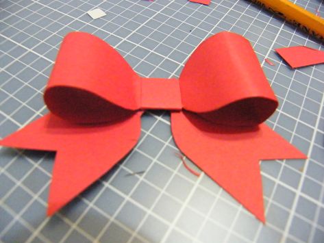 scrapbook paper bows | Looking for a great paper Bow for your greeting cards!!! Here is a ... Bow With Paper, Paper Bow Template, Make A Ribbon Bow, Wrapping Paper Bow, Paper Bows Diy, Christmas Present Bow, How To Make A Ribbon Bow, Wrapping Paper Bows, Christmas Bows Diy