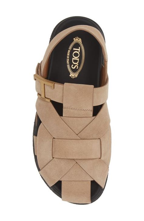 Find TOD'S T-logo Fisherman Sandal on Editorialist. A polished brand-engraved 'T' details the adjustable strap atop this fisherman sandal crafted from calfskin suede in a signature Tod's weaving pattern. Adjustable hook-and-loop strap Elasticized slingback strap Leather upper and lining/rubber sole Made in Italy Women's Designer Shoes Fisherman Sandals Women, Cult Gaia Bag, Gents Shoes, Kd Shoes, Men Dior, Woven Shoes, Fisherman Sandals, Suede Fashion, Flatform Sandals