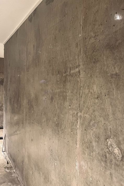 We love board formed polished concrete walls! Adorning a basement from 1972, these industrial polished walls add a modern energy and bring the space to life. Exposed Concrete Wall Basement, Polished Concrete Walls Interiors, Polished Concrete Basement, Polished Concrete Wall, Concrete Walls Interior, Painting Concrete Walls, Concrete Basement Walls, Coloured Walls, Concrete Basement Floors