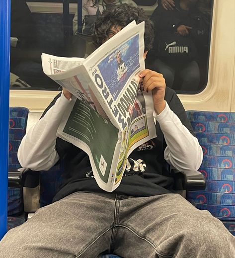 Reading Newspaper Pose, Newspaper Reading Aesthetic, Train Reference Photo, Guy Reading Newspaper, Reading Reference Pose, Guy On Train, Reading Newspaper Aesthetic, Person Reading Newspaper, Newspaper Reference