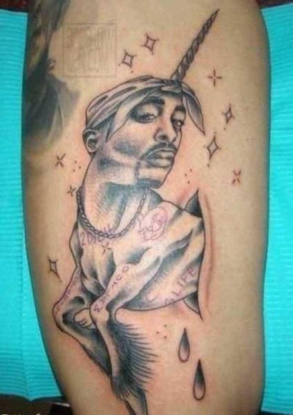 Tupac Tattoo, Dumbest Tattoos, Really Bad Tattoos, Horrible Tattoos, Unicorn Tattoo, Best Tattoo Ever, Fan Tattoo, Unicorn Tattoos, Tattoo Fails