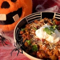 Spooky Slow Cooker Turkey Lentil Chili - Allrecipes.com  #MyAllrecipes #AllrecipesAllstars #AllrecipesFaceless Potluck Main Dish, Super Bowl Potluck, Turkey Lentil Chili, Halloween Potluck Ideas, Halloween Potluck Recipes, Turkey Lentil, Lentil Chili Recipe, Halloween Potluck, Halloween Snack Mix