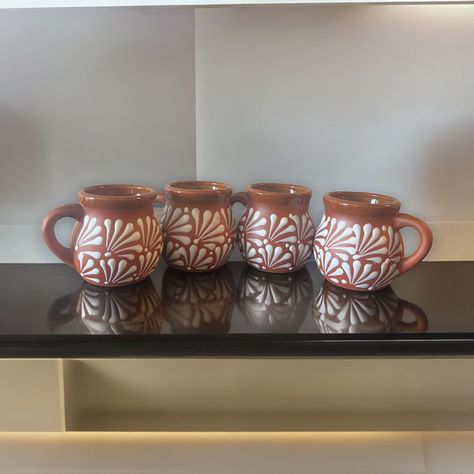 Welcome to our vibrant collection of Talavera Clay Jarritos! Each mug is meticulously handcrafted by skilled artisans in Mexico, adding a touch of authenticity and tradition to your kitchenware. Embrace the warmth of Mexican artistry with these charming mugs, perfect for serving your favorite beverages or adding a decorative flair to your space. STYLE: Crafted in the iconic Talavera style, these mugs feature intricate patterns and vibrant colors, making each piece a unique work of art. QUALITY: Clay Jarritos, Mexican Mugs, Mexican Ceramics, Mexican Heritage, Talavera Pottery, Mexican Talavera, Daily Rituals, Clay Mugs, Mexican Culture