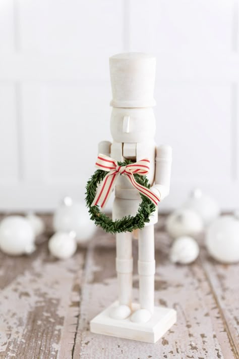 White And Gold Nutcracker Diy, White Christmas Decor Aesthetic, Elegant Nutcracker Christmas, Modern Nutcracker Decor, Modern Nutcracker Christmas, Wooden Nutcrackers Diy, Wood Nutcracker Diy, Hobby Lobby Nutcracker Diy, Painting Nutcrackers Diy