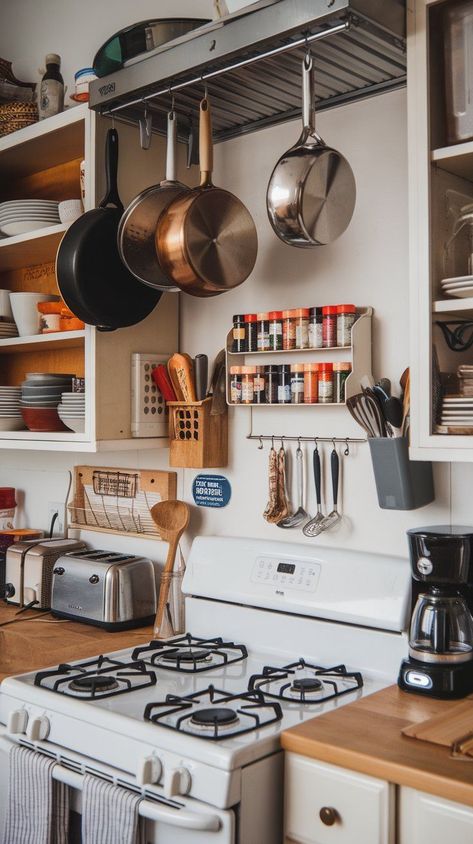 Discover 20 genius kitchen organization ideas to help you keep your space tidy and functional. From maximizing cabinet storage to decluttering countertops, these tips will ensure every item has its place. Perfect for kitchens of all sizes, these clever solutions will help you organize utensils, cookware, and pantry goods with ease. Say goodbye to clutter and hello to a more efficient, stress-free kitchen. Kitchen Cookware Organization, Organize Utensils, Diy Kitchen Organization Ideas, Diy Kitchen Organization, Maximalist Kitchen, Stylish Kitchen Design, Cookware Organization, Kitchen Organization Ideas, Kitchen Clutter