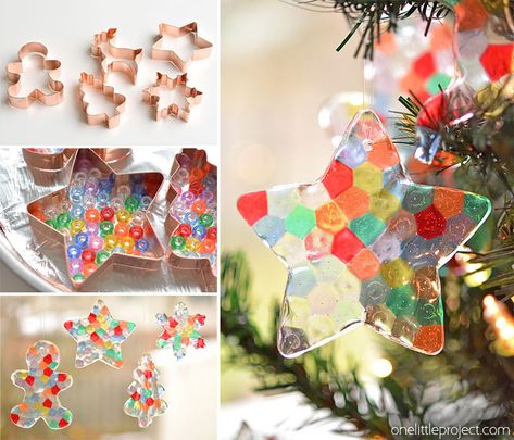 These melted bead ornaments are SO BEAUTIFUL! And they're so easy to make with pony beads! You can hang them on the Christmas tree, or use suction cup hooks on the window to turn them into sun catchers. Melted Bead Ornaments, Melted Pony Beads, Peppermint Candy Ornaments, Yarns Ornaments, Bead Ornaments, Homemade Christmas Decorations, Fun Christmas Crafts, Melting Beads, Beaded Christmas Ornaments