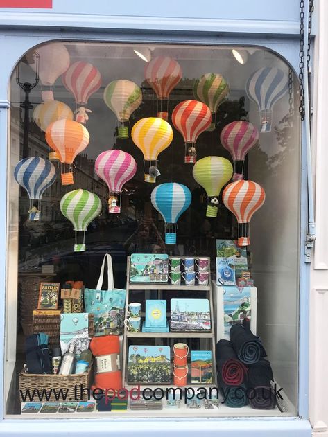 Shop Window Displays Ideas Summer, Hot Air Balloon Window Display, Balloon Store Display, Picnic Window Display, Art Shop Window Display, Kite Window Display, Toy Window Display, Summer Display Window, Gift Shop Window Display