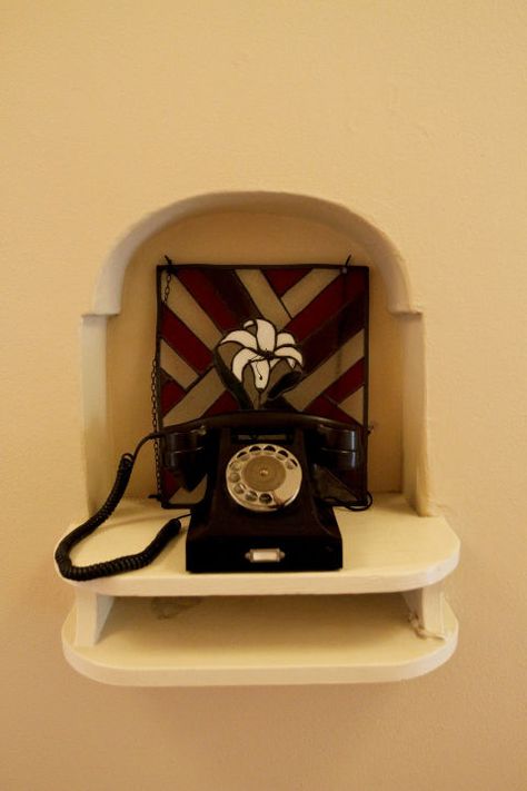 Let me guess: You never know where you put your phone. That is, of course, unless you live in a house with a telephone nook. Found… Old Southern Homes, Interior Shutters, Colourful Tile, House Features, Glass Knobs, New Homeowner, Home Decorators Collection, Basement Remodeling, Classic House