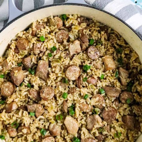 This classic Cajun pork jambalaya is made of tender junks of pork, smoked sausage, white rice, and flavored with spicy Cajun seasonings. Cajun Dishes Louisiana, Pork Jambalaya Recipe, Louisiana Rice, Cajun Pork, Homemade Jambalaya, Jambalaya Rice, Nola Recipes, Sausage Jambalaya, Creole Cooking